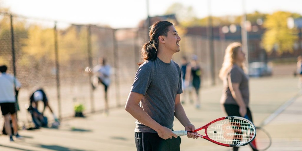 How does an adult tennis league work for busy schedules? (Flexible options for playing matches when you can)